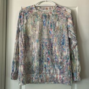 Long sleeve light multi color top.  Is soft and washes beautifully.  Never worn